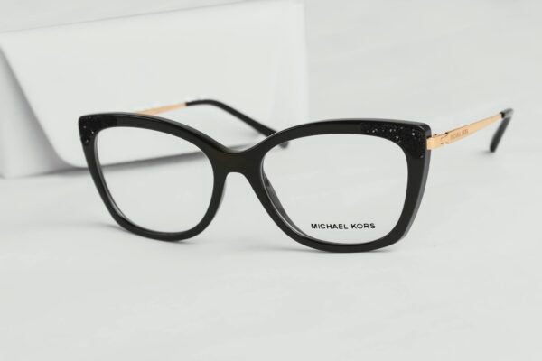 Chic black cat eye eyeglasses by Michael Kors with luxurious design accents.