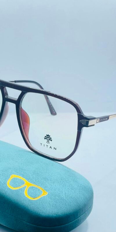 Close-up of fashionable eyeglasses with a blue protective case, ideal for modern style.